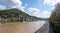 Germany, view of Heidelberg traditional city build at Neckar riverside. Moored boat nature around