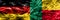 Germany vs Benin smoke flags placed side by side. German and Ben