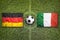 Germany vs. Italy flags on soccer field