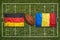 Germany vs. Romania flags on rugby field