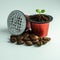 Germinate the plant in a used coffee capsule. Capsules for espresso coffee. BIO-coffee, compostable capsules.