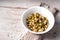 Germinated beans in glass and ceramic bowls closeup