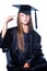 Gesticulating girl in graduation dress on isolated