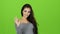 Gesture all okay shows girl on green screen background