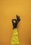 Gesture everything is fine, female hand in a medical black glove, 2019 nCoV protection,