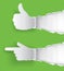 Gesturing paper hands green background.