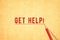 Get Help! Message Written in grungy Texture Yellow paper. Red pencil underline