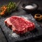 Get inspired by the beauty and quality of Japanese beef with this top view of a raw wagyu A5 Japanese steak on a slate