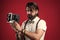 get a pose. elegant male hold retro camera. handsome hipster making vintage photo. mature journalist use old technology