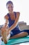 Getting loose and limber. an attractive young woman stretching on a yoga mat.