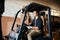 Getting orders on the move. a handsome young man driving a forklift inside a warehouse.