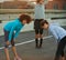 Getting psyched for their run. a group of joggers warming up for an early morning run.