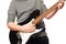 Getting to grips with chords. Cropped image of a young boy playing a guitar.