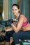 Getting a toned and fit body. Portrait of an attractive young woman doing weight training in a gym.