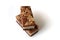 Gevulde speculaas (brown spiced biscuit) on white