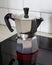 Geyser coffee maker. Making coffee set on the white table top view. Silver geyser coffee maker. Device for kitchen.