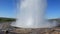 Geyser eruption in a sunny day, Iceland