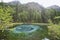 Geyser mountain lake with blue clay. Altai, Russia