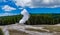 Geyser Old Faithful erupts in Yellowstone National Park in Wyoming, US