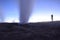 A geyser shoots out of the ground, a photo at dawn on a long exposure., on Eduardo Avaroa National Reserve in Uyuni