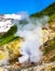 Geyser valley in miniature near Mutnovsky volcano in Kamchatka peninsula, Russia