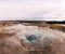 Geyser Valley in the southwest of Iceland. The famous tourist attraction Geysir. Geothermal zone Haukadalur. Strokkur