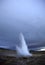 Geysir erupting at dusk