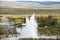 Geysir Strokkur in Iceland erupts with tall fountain