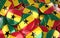 Ghana Badges Background - Pile of ghanaian Flag Buttons.