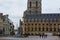 Ghent, Belgium; 10/29/2018: Sint-Baafsplein square with the statue of Jan Frans Willems and the Belfry Het Belfort at the