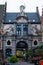 Ghent, Belgium; 10/29/2018: Vertical picture of the facade of the Fish Market with the statue of Neptune in Sint-Veerleplein