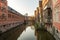 Ghent, Belgium - April 9, 2020: The Old Fish Market, with the floating terrace of Maison Elza in the foreground