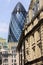 The Gherkin contrasted with vintage buildings