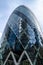 The Gherkin or St Mary Axe building in the city of London. This iconic structure is home to many global businesses such as Sky