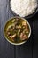 Ghormeh Sabzi Persian Herb Stew with meat and beans closeup in a bowl. Vertical top view