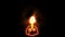 Ghost skull with candle increase burning to Halloween text flame effect on black screen