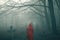 Ghost woman in red dress on dark horror forest cemetery