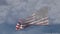 Ghosted Slow Motion American Flag Waving In Wind with Time-lapse Clouds