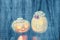 Ghostly Halloween pumpkins on a wooden background