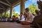 An Giang, Vietnam - Dec 6, 2016: Champa Buddhists praying in temple at ordination ceremony that change the Vietnamese young men to