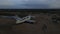 A giant abandoned aircraft crashed on the coast. Hybrid amphibian aircraft. Aerial.