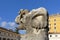 Giant ancient animal head in 16th-century garden, Cloister of Michelangelo at 3rd century Baths of Diocletian, Rome, Italy