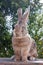 Giant belgian rabbit, brown sitting bunny