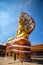 Giant Buddhawith Naga serpent temple in Singburi, Thailand