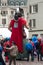 giant character with medieval costume parading in the street