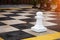 Giant chess, street game. Play chess in the street