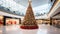 A giant Christmas tree in the middle of a shopping mall . Generative AI