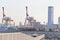 giant container ship pass through the channel of tokyo bay near Odaiba