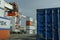 Giant crane surrounded by Containers at Matosinhos LeixÃµes port on the north Portugal