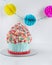 Giant Cupcake Birthday Smash Cake on light surface, copy space. Celebration party concept